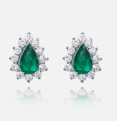 Emerald 0.70 ct & Diamonds total 0.24 ct